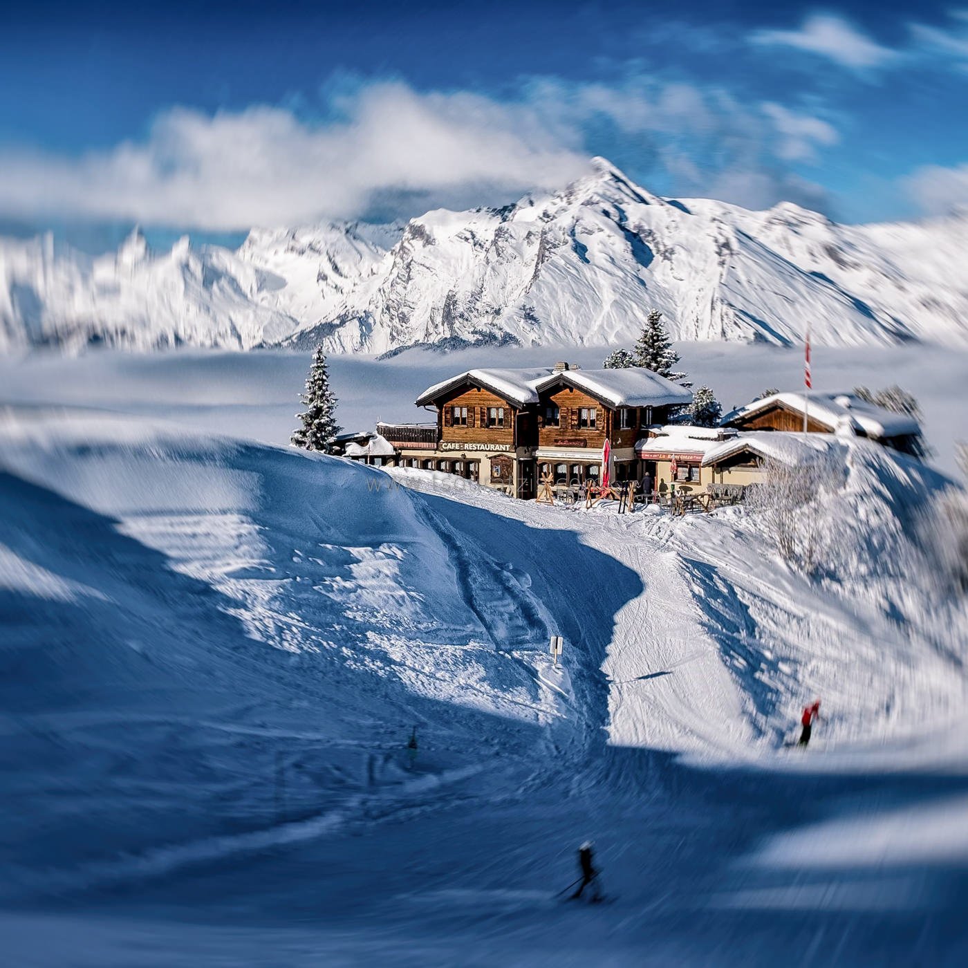 Skier in 4 Vallees ski resort Veysonnaz, Valais canton, Swiss Alps