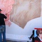 repainting the Berlin wall 20 years after its fall. berlin 2009