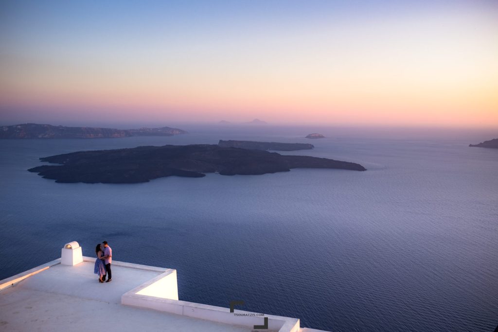 Santorini island couple posing wedding photos