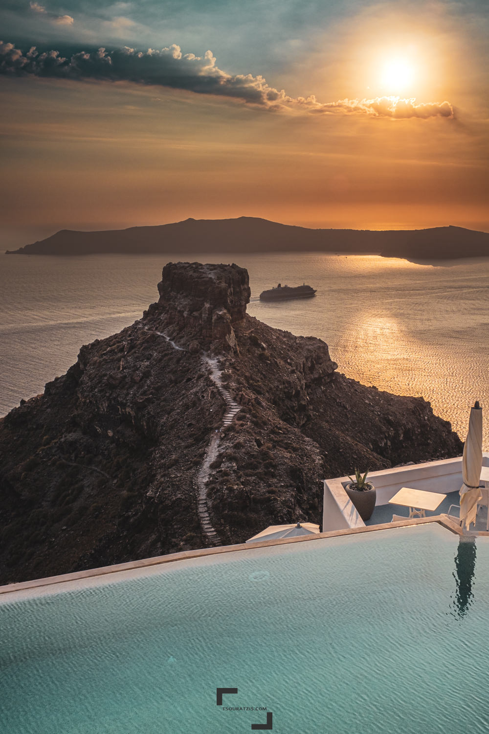 Santorini island sunset imerovigli skaros swimming pool