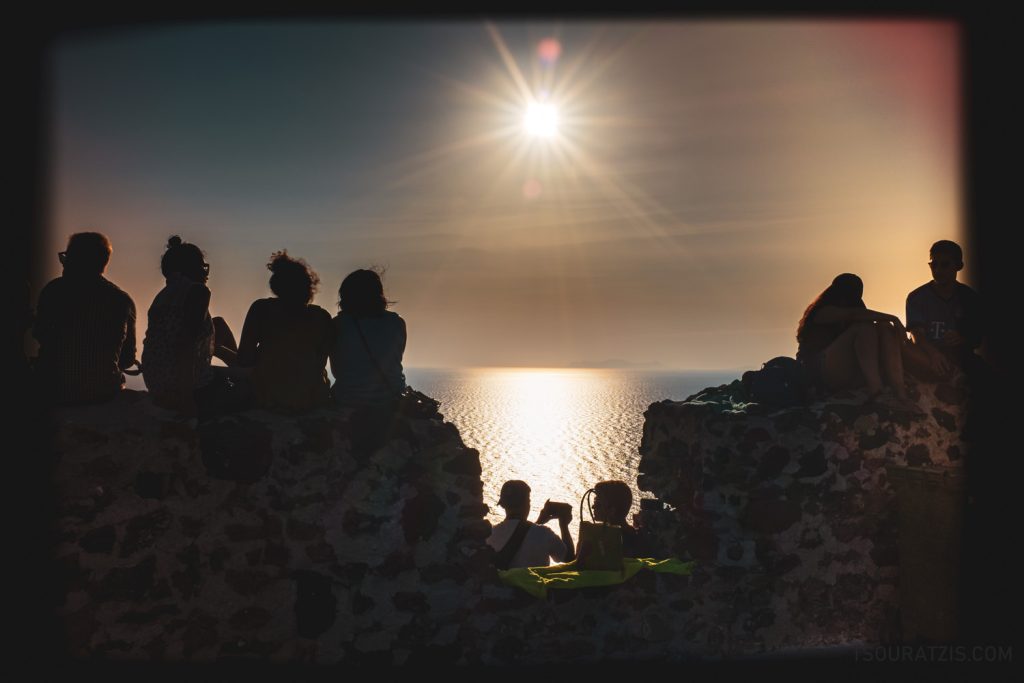 people waiting for Oia sunset Santorini island