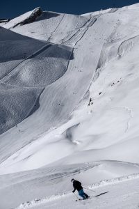 Anzère ski station red slope skier