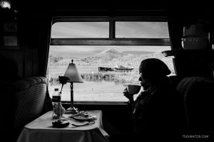 In the tourist train crossing Andes from Puno to Cusco cities Peru