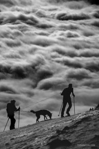 Landscape view over the clouds of cross country skiers