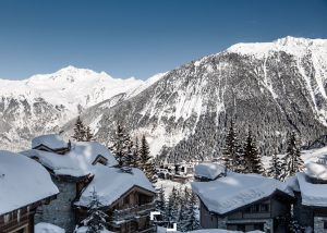 Courchevel village and wooden chalets in the French Alps