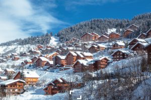 Meribel village and wooden chalets in the French Alps