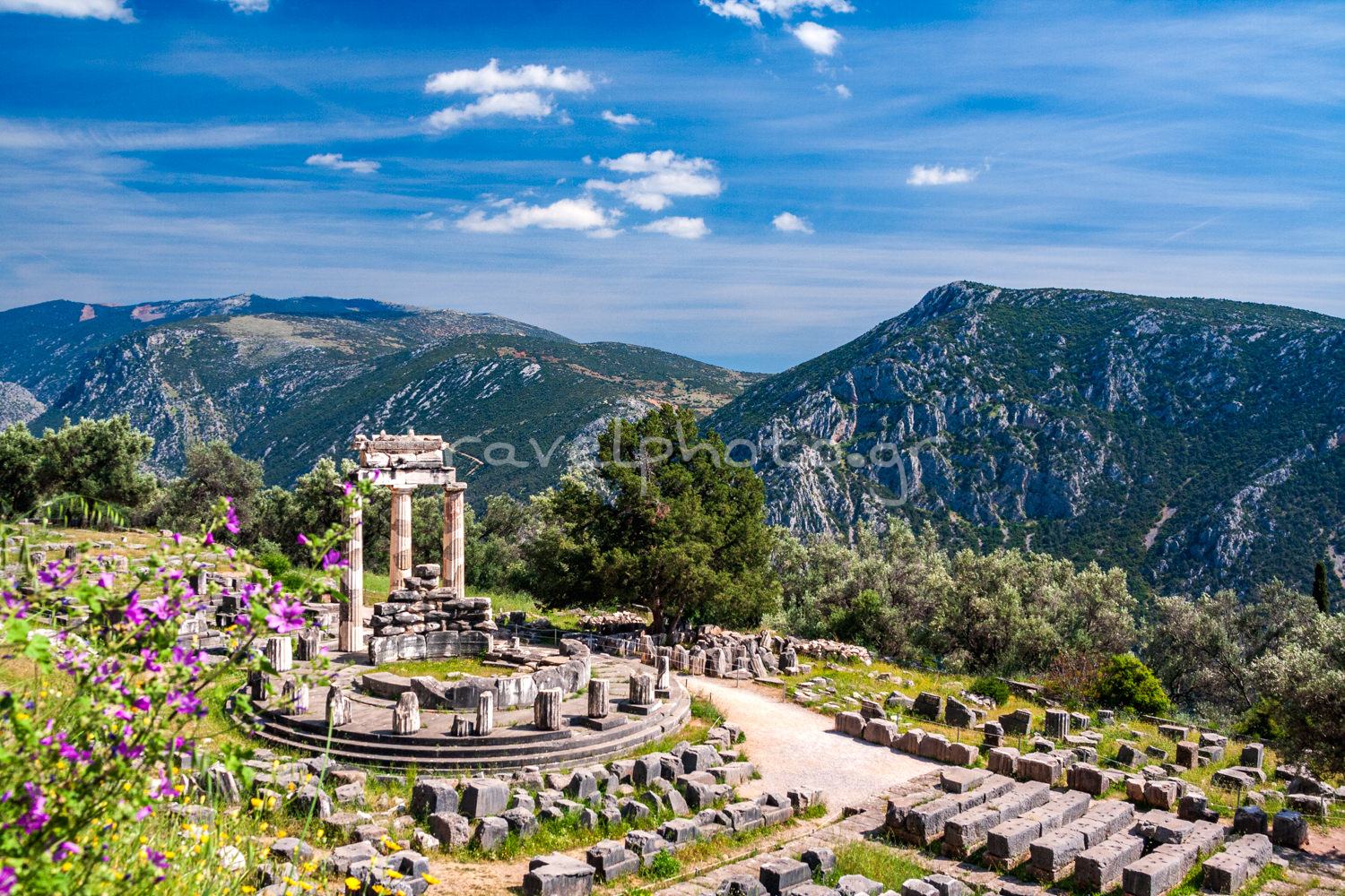 Delphi Tholos of Athena Pronaia Ancient and the greek blue sky